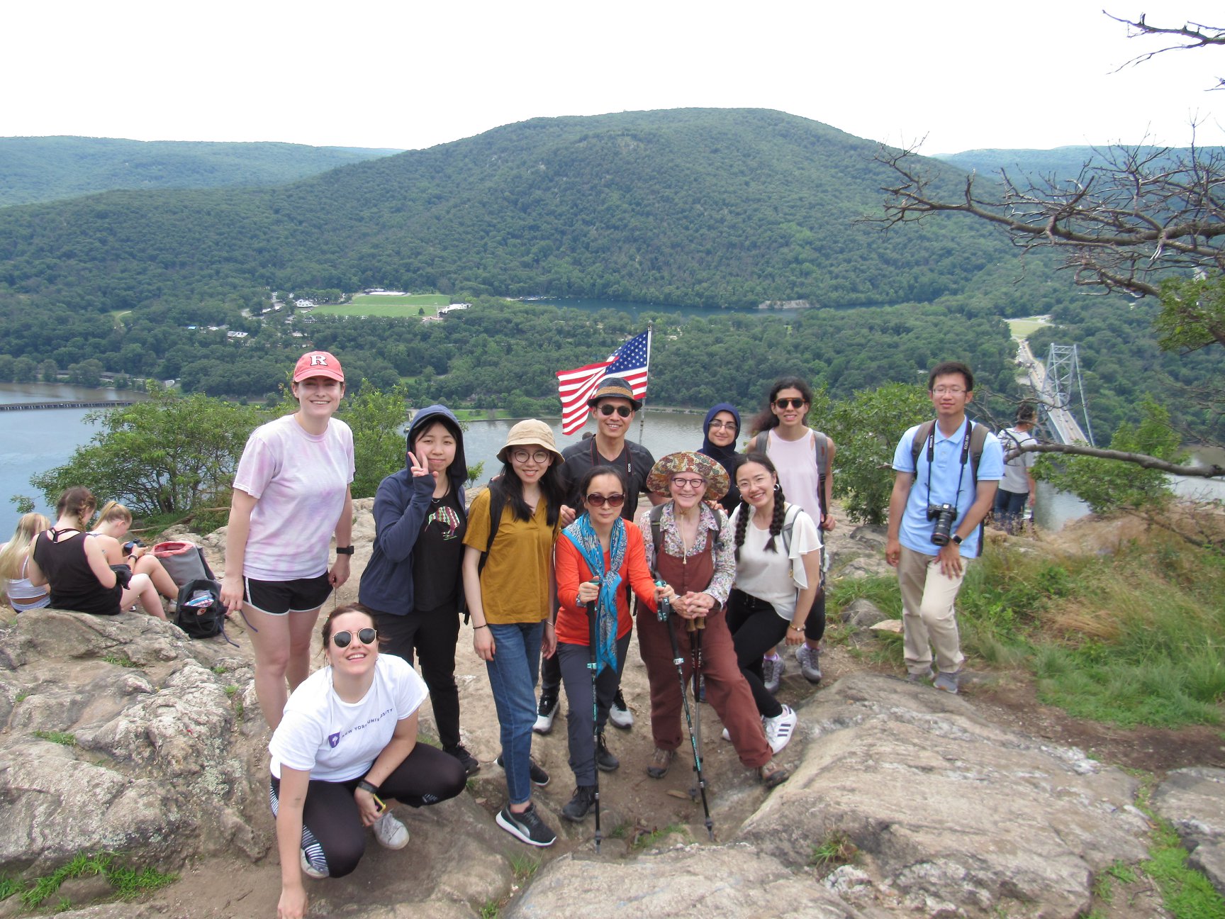 A group of students posing in front of Anthony's Nose